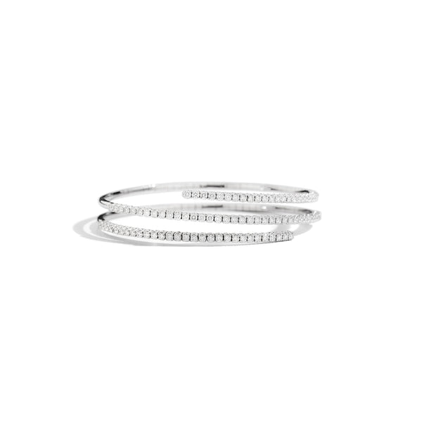 ANNIVERSARY Triple-row bracelet with harmonious gold spring, 18 Kt white gold and brilliant-cut diamonds