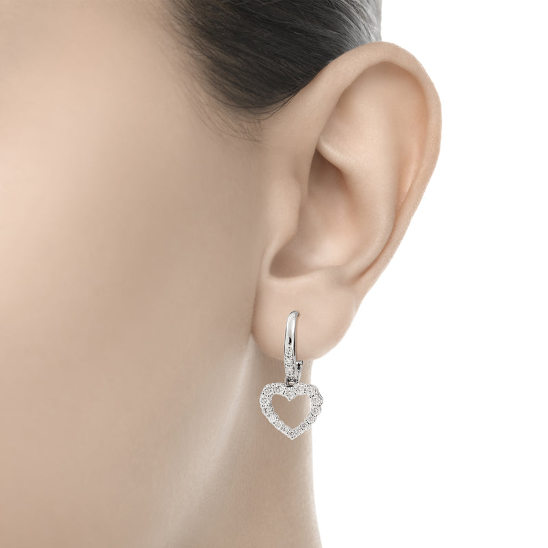 ANNIVERSARY Bezel-set heart shape claps earrings 18 kt white gold and diamonds 0.50ct