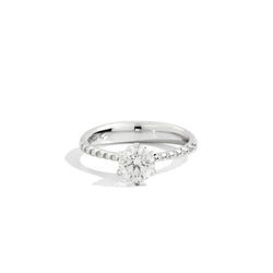 ANNIVERSARY Six-prong solitaire ring with diamond band, 18 kt white gold and diamonds