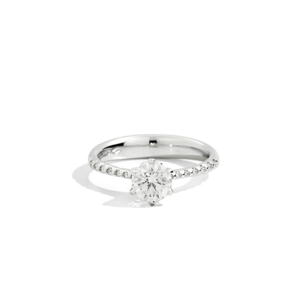 ANNIVERSARY Six-prong solitaire ring with diamond band, 18 kt white gold and diamonds