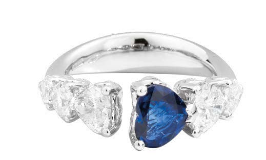 ANNIVERSARY LOVE Graduated contrarié ring 18 kt white gold, brilliant-cut heart-shaped diamonds and central heart-shaped sapphire