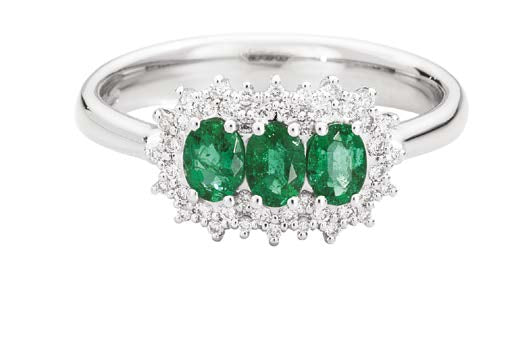 CAMELIA Trilogy with coloured centre 18 kt white gold,diamonds and oval emeralds