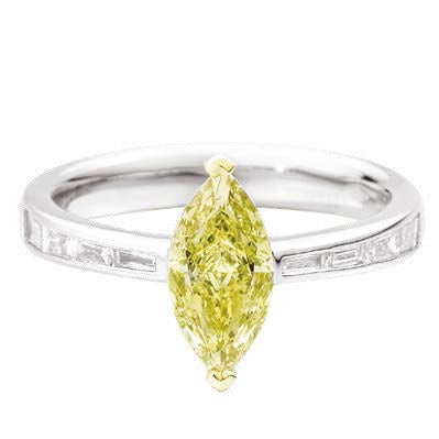 ATELIER solitaire ring 18 kt white and yellow gold, central yellow fancy navette-cut diamond ct. 1,37 (cert.GIA) and taper-cut band ct. 0,30