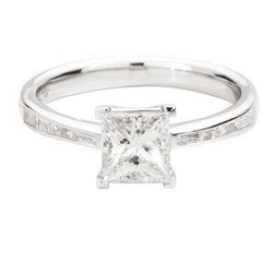 ATELIER Solitaire ring with brilliant-cut princess-shaped natural diamond from 1.00ct 8 taper-shaped natural diamonds 0.17ct