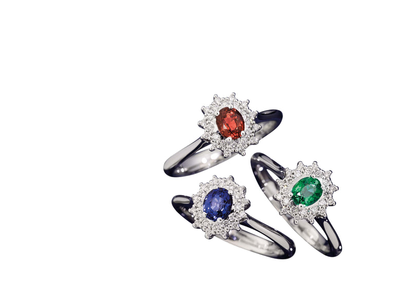 CAMELIA Ring with coloured centre 18 kt white gold,diamonds and oval sapphire